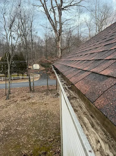 Gutters after professional cleaning service in Pocono Mountains - clear and debris-free