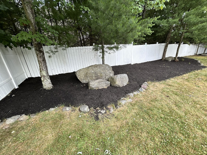 Fresh landscaping and premium mulch installation in the Pocono Mountains